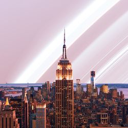 New York at dawn with fictional Saturn-like rings visible in the sky.