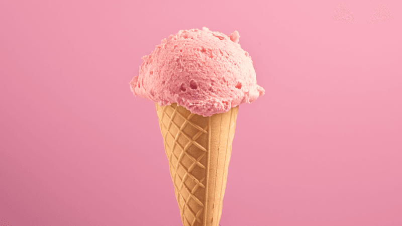 an ice cream on a pink background