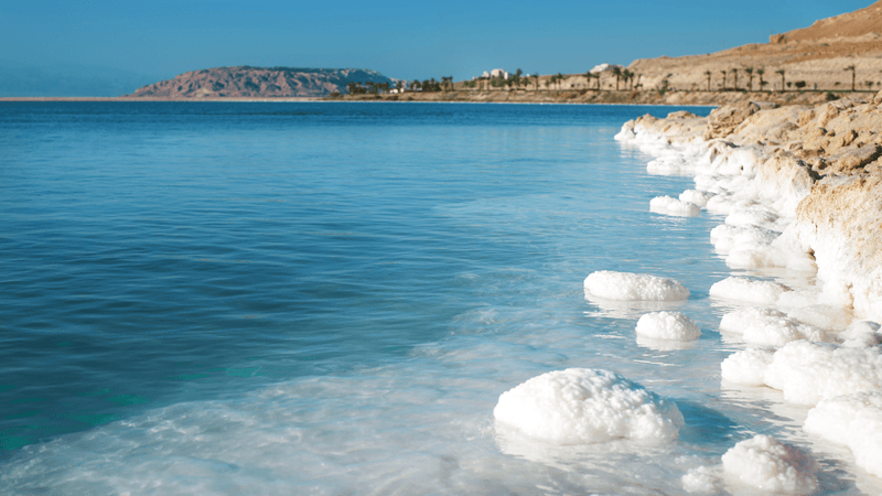 the dead sea with incredibly high salt levels due to evaporation