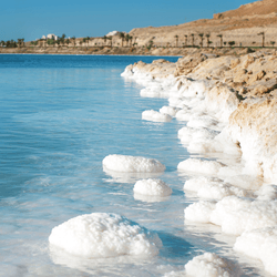 the dead sea with incredibly high salt levels due to evaporation